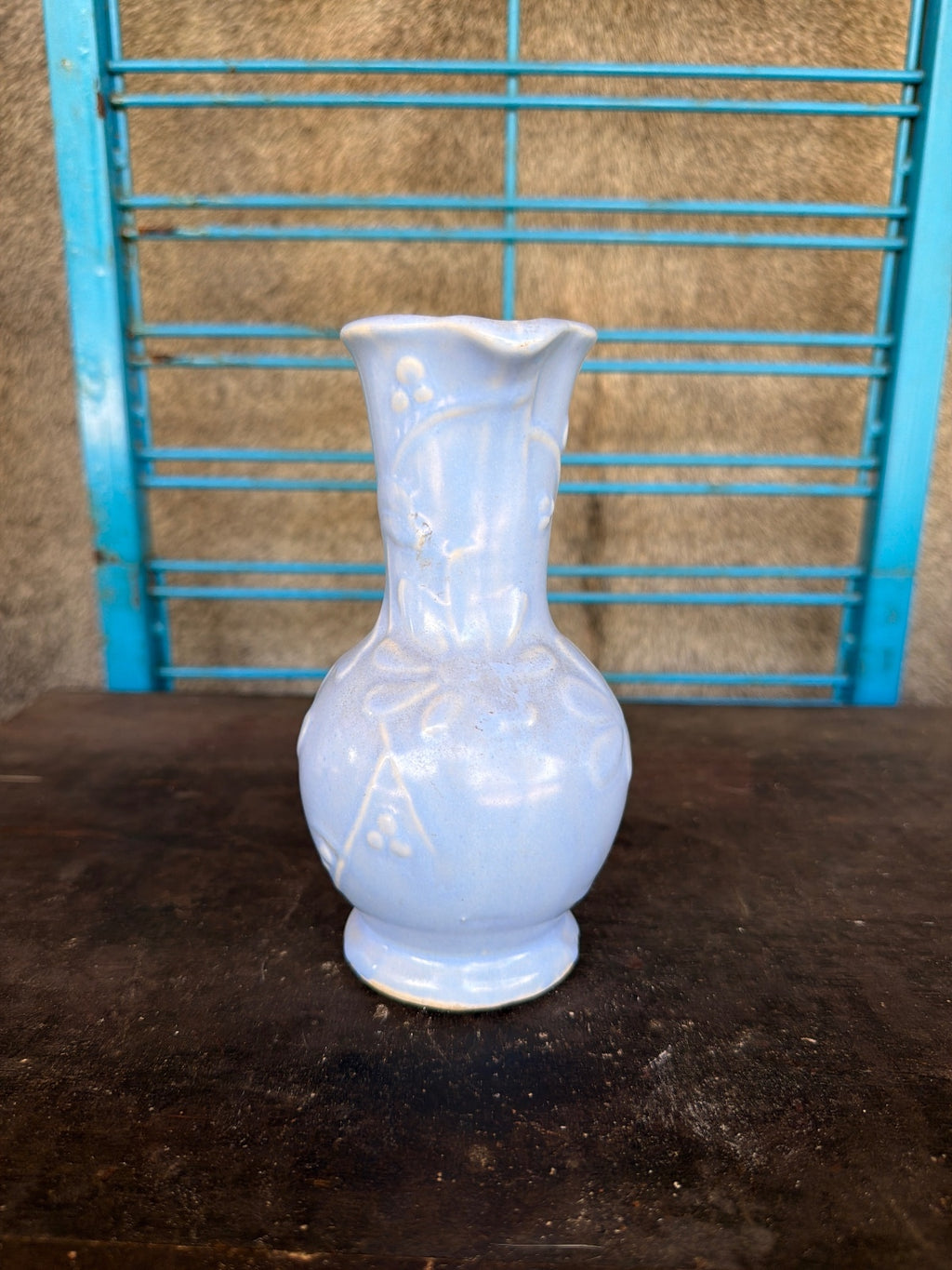 Vintage Light Blue Ceramic Pitcher with Floral Relief Design
