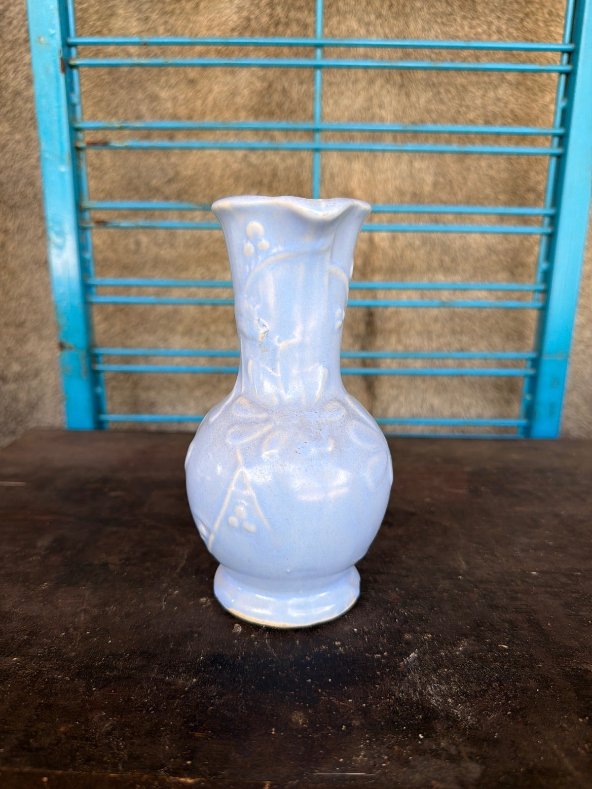 Vintage Light Blue Ceramic Pitcher with Floral Relief Design