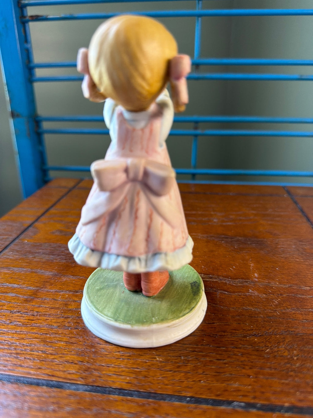 Vintage Ceramic Figurine of Girl Holding a Yellow Bird