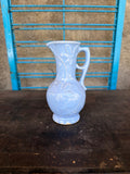 Vintage Light Blue Ceramic Pitcher with Floral Relief Design