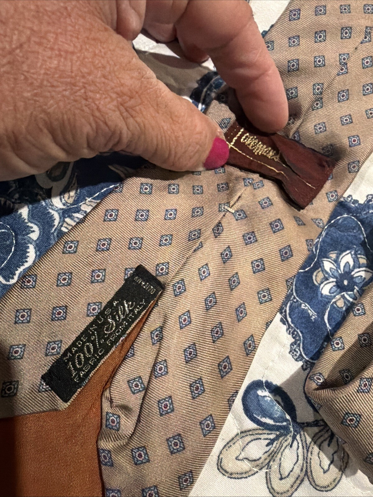 Vintage Men's Brown Silk Tie with Blue Geometric Pattern